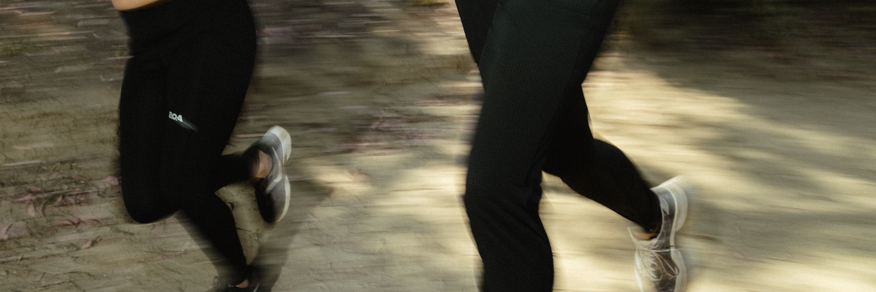 People running with black pants
