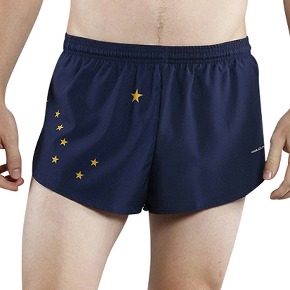 Men's Flag 1" Elite Split Shorts in navy blue featuring gold stars in the pattern of the Alaska state flag, shown worn by a male model.