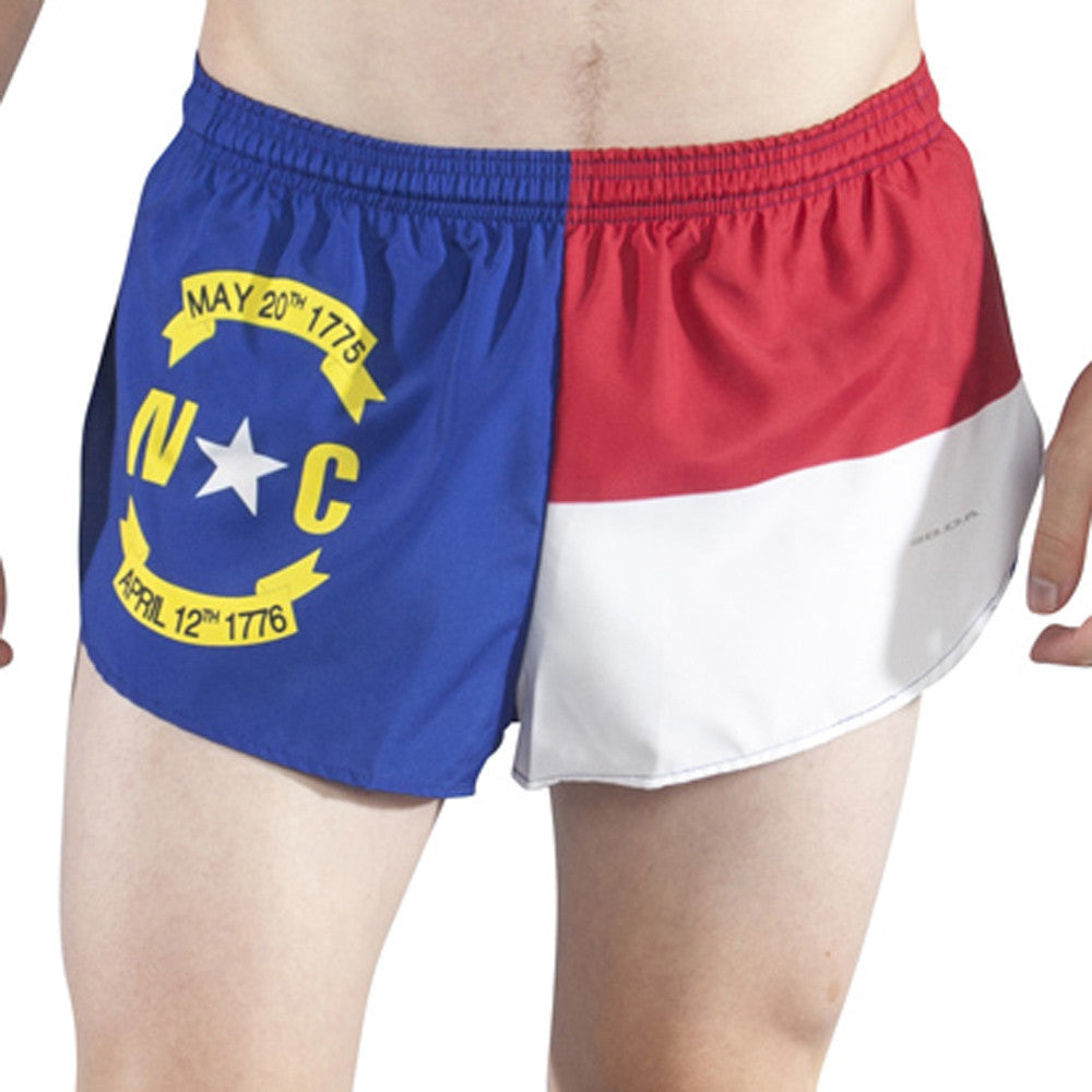 Men's Flag 1" Elite Split Shorts featuring the North Carolina state flag design with a blue panel displaying the NC emblem, May 20th 1775 and April 12th 1776 banners, and red and white vertical stripes on the right panel with an elastic waistband.