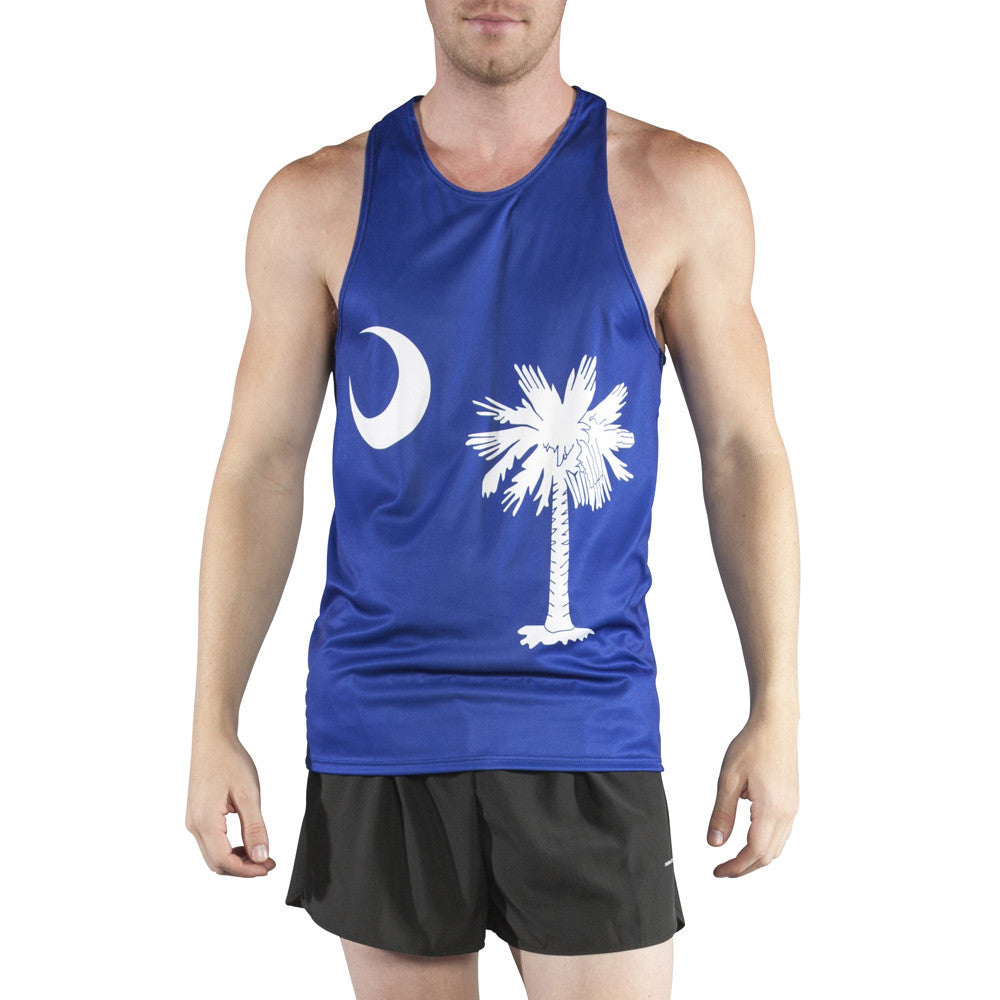 Men's Competitor Lite Printed Singlet featuring the South Carolina state flag design with a white palmetto tree and crescent moon on a royal blue lightweight running tank top, paired with black athletic shorts.