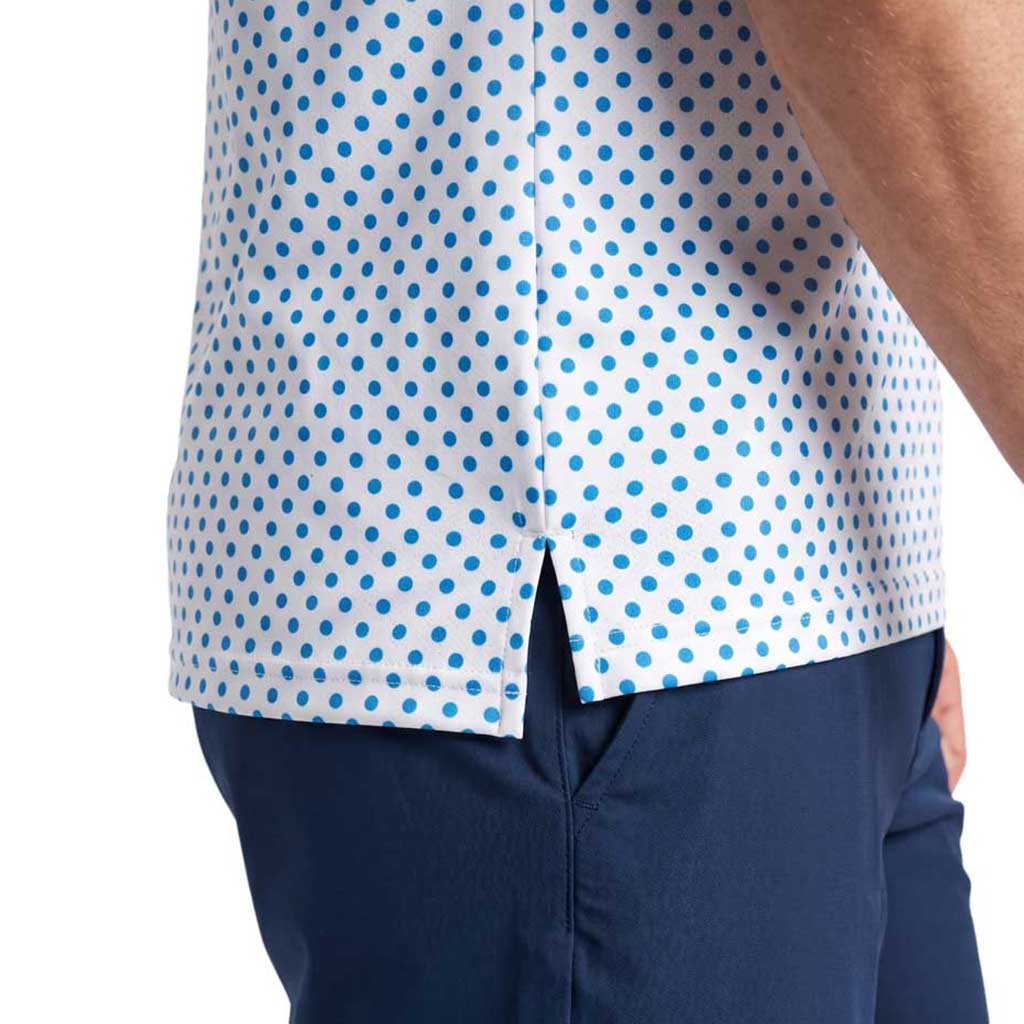 Men's Vapor Lite Racing Singlet - America 250, a white short-sleeve polo shirt featuring a blue polka dot print, paired with navy blue pants.
